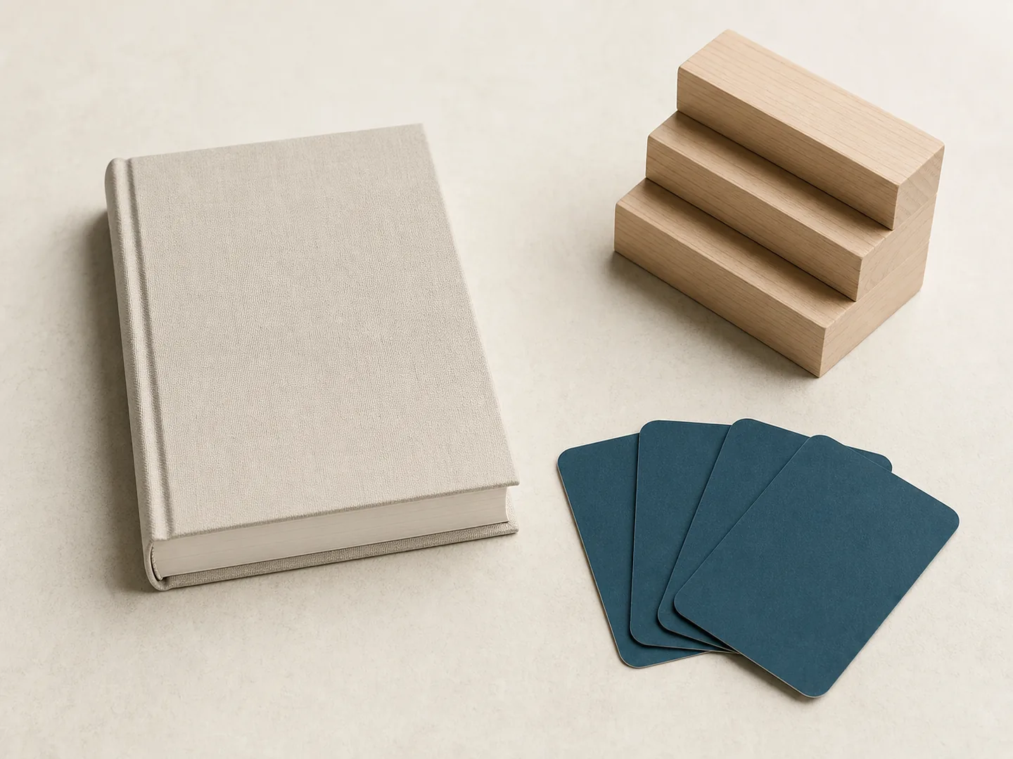 Book, learning cards, and wooden steps represent an accessible family learning path