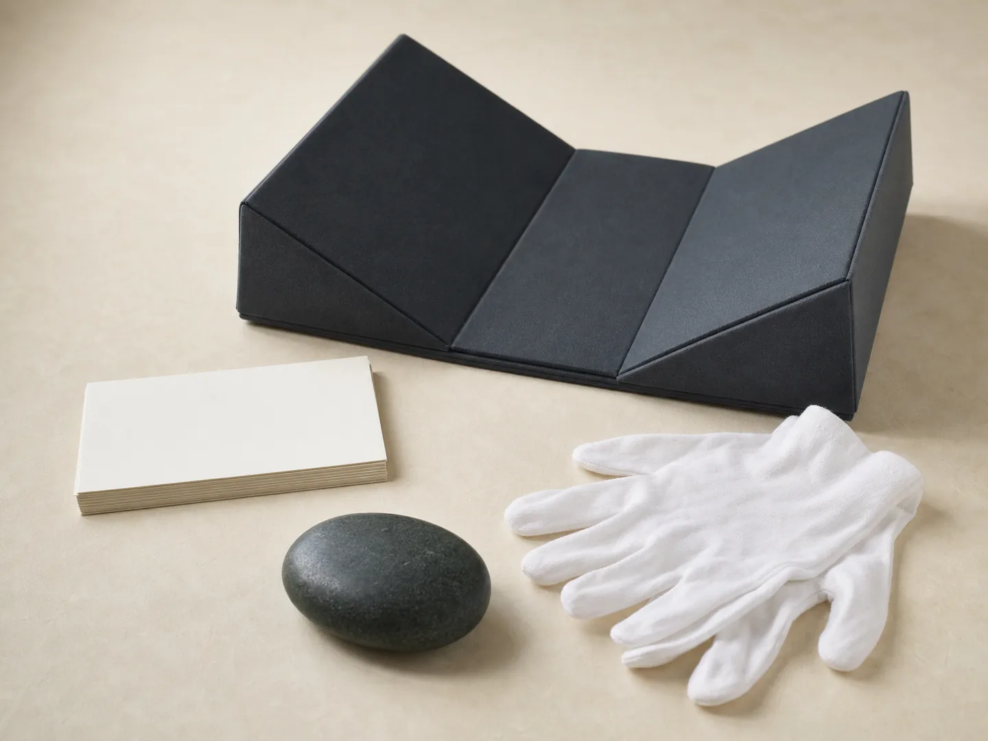 Book cradle, cards, and gloves represent careful access to library materials